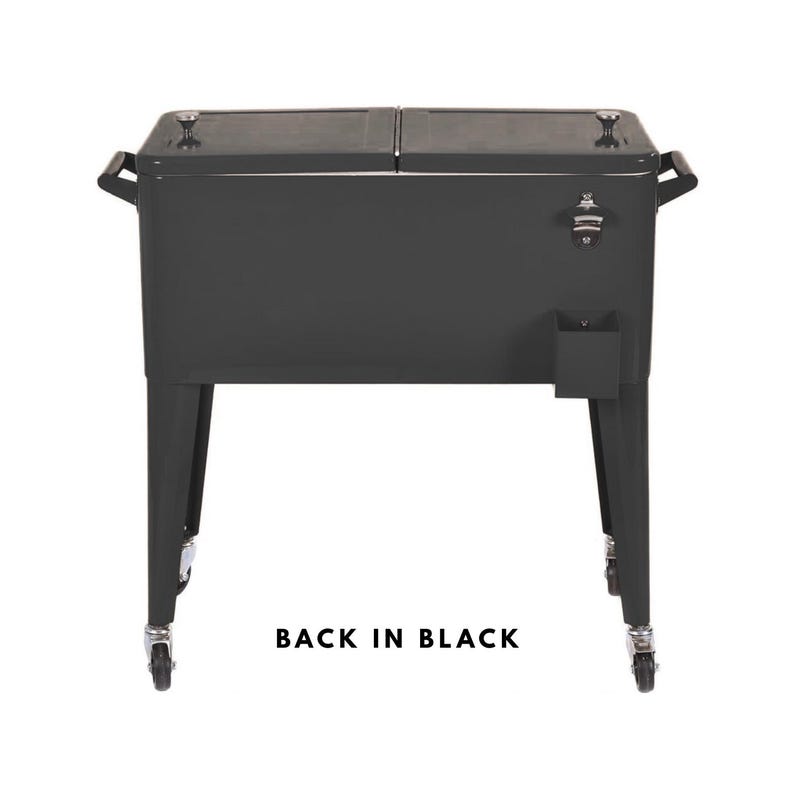 May include: A black metal cooler with a bottle opener and a small storage compartment. The cooler has two hinged lids, handles, and sits on four legs with wheels. The text "BACK IN BLACK" is printed at the bottom.
