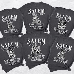 May include: Five gray t-shirts with white text and graphics. The shirts say "Salem Girls Trip" and feature a witch with a cauldron, a witch with a wand, a witch with a pumpkin, a witch with a potion, and a witch with a broom. The text below each witch describes what they are most likely to do.