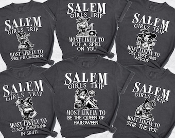 Könnte beinhalten: Fünf graue T-Shirts mit weißem Text und Grafiken. Die Shirts sagen "Salem Girls Trip" und zeigen eine Hexe mit einem Kessel, eine Hexe mit einem Zauberstab, eine Hexe mit einem Kürbis, eine Hexe mit einem Zaubertrank und eine Hexe mit einem Besen. Der Text unter jeder Hexe beschreibt, was sie am wahrscheinlichsten tun wird.