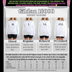 May include: Size chart for Gildan 18000 crewneck sweatshirts. The chart shows measurements in inches for width, length, and sleeve length for sizes S through 5XL. The chart also includes information about the fit of the sweatshirt, which is described as fitted, regular, relaxed, or oversized.