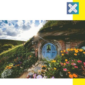 May include: A hobbit house with a round blue door surrounded by a lush garden with colorful flowers. The house is built into a hillside and has a thatched roof.