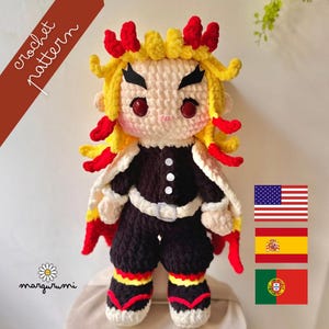 May include: A handmade crochet doll with yellow, red, and black accents. The doll has a black outfit with a white cape and yellow hair. The text "crochet pattern" is visible in the upper left corner, and the word "margurumi" is visible in the lower left corner.