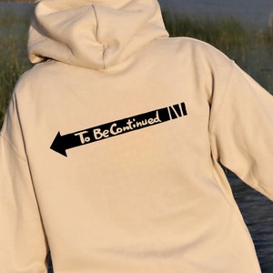 To Be Continued Arrow Backside Hoodie & Crewneck, Heavy Cotton Outerwear, Inspired Design, Quality Gifts For Friends