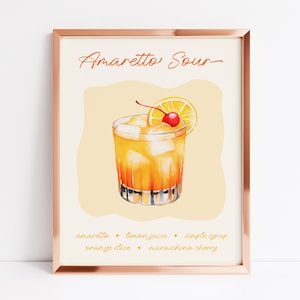 May include: A printable art print featuring a watercolour illustration of an Amaretto Sour cocktail. The cocktail is in a rocks glass with a maraschino cherry and a lemon wedge. The text "Amaretto Sour" is at the top of the print. The ingredients are listed below the image: "amaretto, lemon juice, simple syrup, orange slice, maraschino cherry."