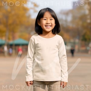 Rabbit Skins 3302 Mockup Rabbit Skins 3302 White Mockup Long Sleeve Toddler T-shirt Winter Christmas Season White TShirt Asian American Girl