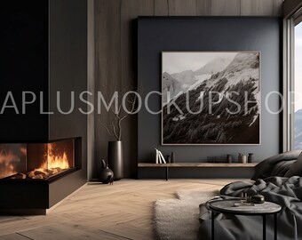 May include: A modern living room with a fireplace, a large framed photograph of a snowy mountain landscape, and a plush gray sofa with a throw blanket. The room has dark wood floors and a dark gray wall with a black shelf.