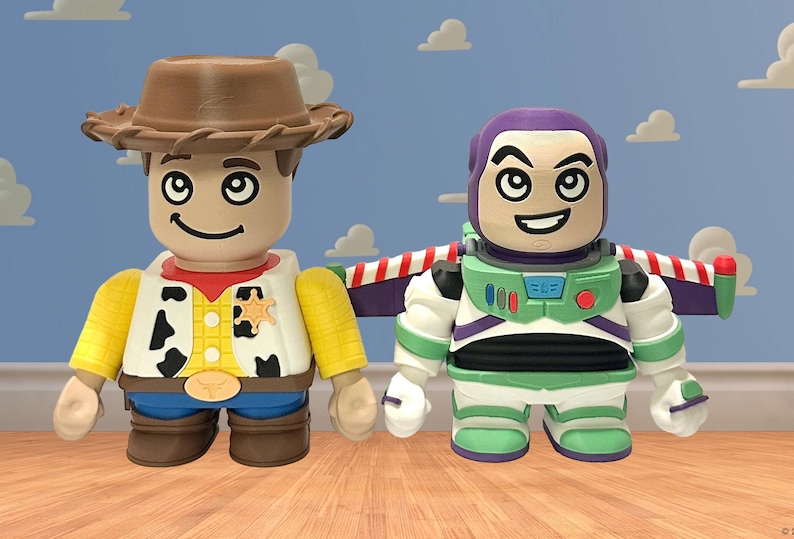 May include: Two character figures from the animated film Toy Story. One figure is dressed as a cowboy with a brown hat, yellow shirt, and blue jeans. The other figure is a space ranger in a green and white suit with purple accents.