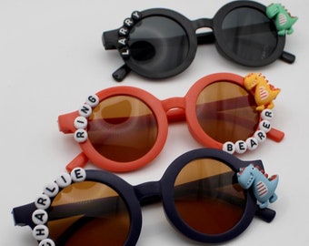 Kinder-Dinosaurier-Sonnenbrille mit Namen