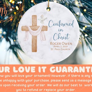 a christmas ornament with a cross on it