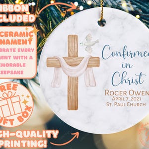 a ceramic ornament with a cross on it