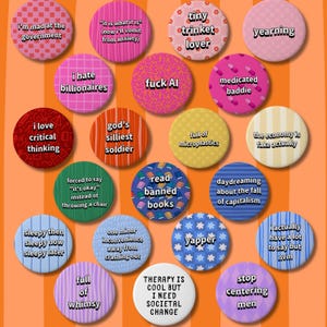 May include: A set of three ceramic mugs with a speckled, matte finish. The mugs are in shades of cream, light gray, and dark gray. Each mug has a simple, minimalist design and a rounded handle.