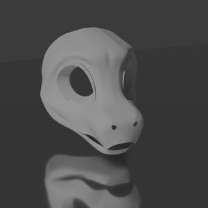 Könnte beinhalten: Eine graue, unbemalte, 3D-gedruckte Tiermaske mit großen Augenlöchern und einer kleinen Nase.