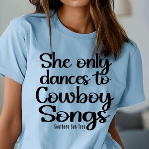 She Only Dances to Cowboy Songs Country Music Graphic Tee Western