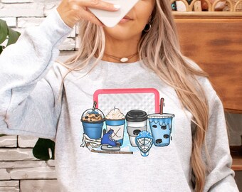 Sudadera de cuello redondo con café y pista de hockey