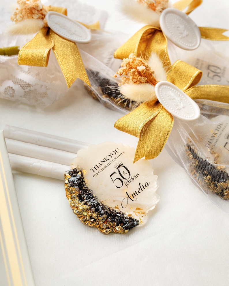 Gold epoxy magnet favor for elegant adult birthday celebrations