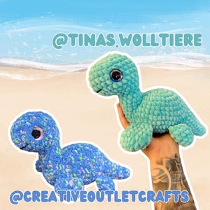 May include: Two handmade crochet turtle plushies. One is blue with colorful flecks, the other is teal. Both have large, expressive eyes. The text "@TINAS.WOLLTIERE" and "@CREATIVEOUTLETCRAFTS" are displayed on the image.