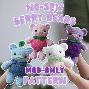 May include: Four crocheted bear plushies in various colors: blue, pink, white, and purple. Each bear has a different berry-themed design, including a strawberry, blueberry, and blackberry. The text "NO-SEW BERRY BEARS" and "MOD-ONLY PATTERN" are displayed.