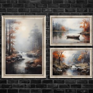 May include: Three framed paintings of misty forest scenes with rivers and waterfalls. The top left painting shows a river flowing through a forest with a waterfall in the background. The top right painting shows a lake with a boat in the middle of the lake. The bottom painting shows a river flowing through a forest with a waterfall in the background.