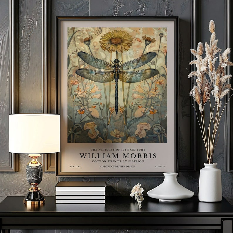 May include: A vintage poster featuring a dragonfly with delicate wings against a backdrop of stylized flowers. The poster is titled "William Morris Cotton Prints Exhibition" and includes the text "The Artistry of 19th Century, Textiles, History of British Design, London."