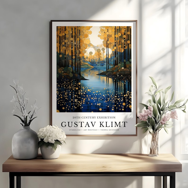 May include: A framed art print featuring a landscape painting in the style of Gustav Klimt. The artwork depicts a river scene with trees and golden orbs. Text at the bottom reads "20TH CENTURY EXHIBITION GUSTAV KLIMT".