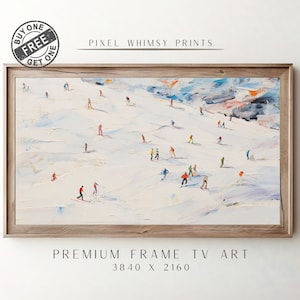 Peut inclure: Une peinture encadrée représentant une scène de montagne enneigée avec des skieurs en vêtements colorés. La peinture est dans un cadre en bois clair et porte le texte "PREMIUM FRAME TV ART 3840 X 2160" imprimé en dessous.