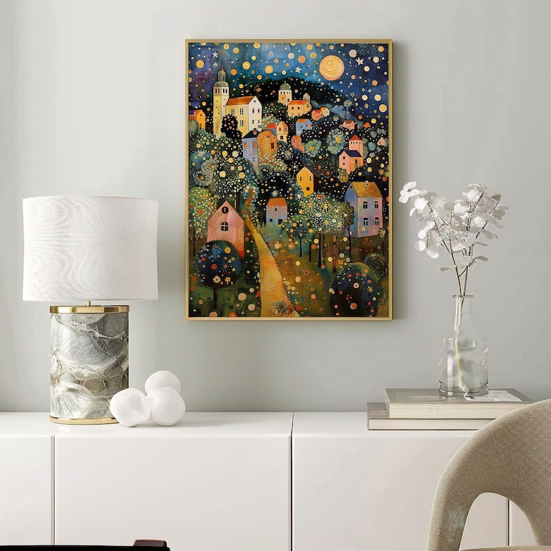 May include: A painting of a whimsical village nestled in a forest at night. The houses are brightly colored and have twinkling lights. The sky is dark blue with stars and a crescent moon. The painting is framed in gold.