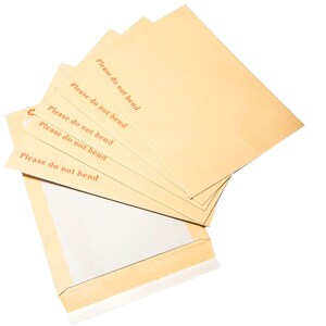 May include: A stack of brown envelopes with the text "Please do not bend" printed on each one.