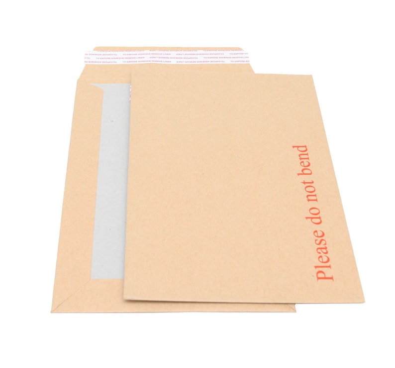 May include: A brown paper envelope with a white strip of tape across the top and the words "Please do not bend" printed in red on the right side.