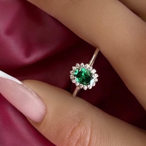 Emerald ring / 14 carat classic oval cut emerald ring with diamonds all around / Emerald ring in gold (D Color VVS1 Clarity). Diana ring