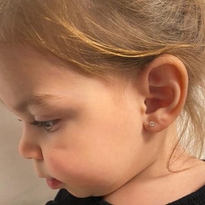 Martini pair, diamond earrings.0.20 14 carat gold.4 prongs, Yellow Gold,natural diamond suitable for women,girls and babies.natural diamond.