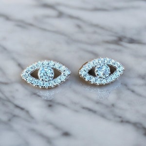 Eye earrings - 0.24 carat. Inlaid with gold and natural diamonds. 14k white gold. The evil eye is  gift for woman or daughter.
