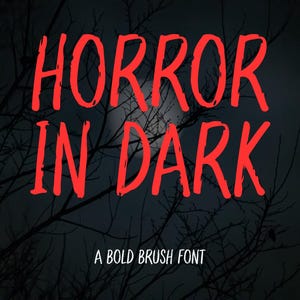 May include: The text HORROR IN DARK is displayed in a bold, red, brush-style font against a dark background featuring the silhouette of bare tree branches and a faint, glowing moon. Below the main text, the words A BOLD BRUSH FONT appear in white.