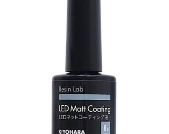 May include: A black bottle of Resin Lab LED Matt Coating with a black cap. The label features white text reading Resin Lab, LED Matt Coating, and KIYOHARA, along with Japanese characters and a small grey box containing the weight of 8g.