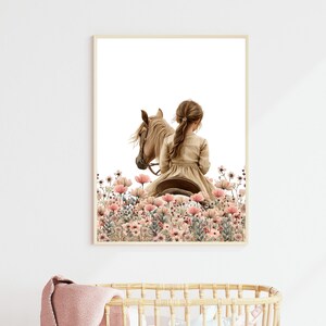 May include: A watercolor painting of a girl riding a horse through a field of pink flowers. The girl is wearing a brown dress and has long brown hair. The horse is brown and white.