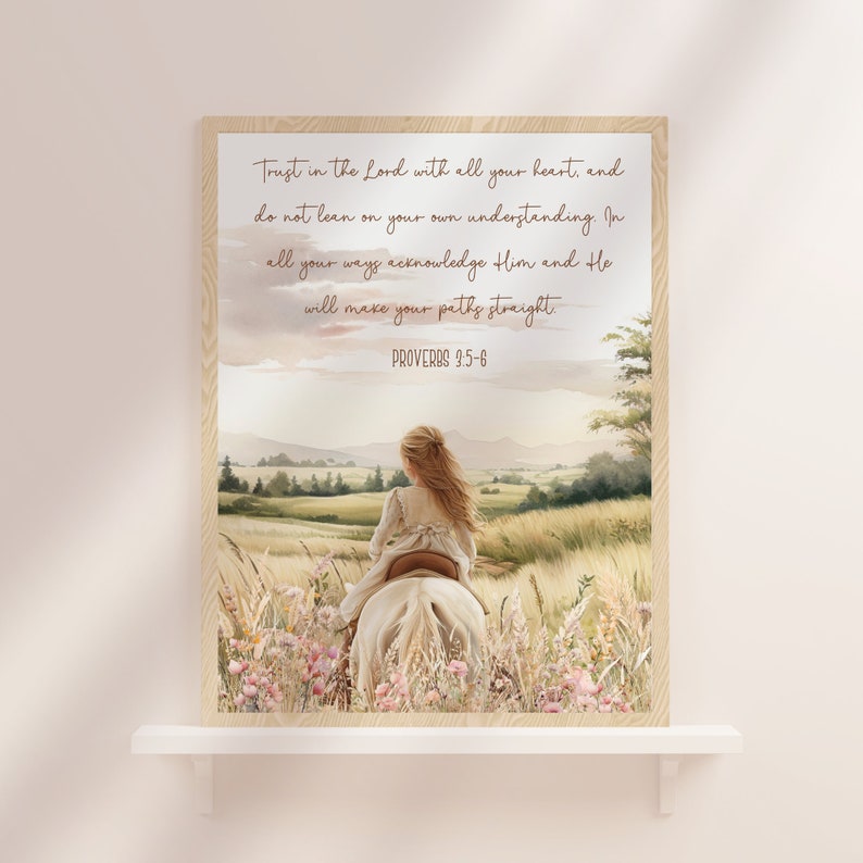 May include: A framed watercolor print featuring a girl riding a white horse through a field of wildflowers. The print includes the text "Trust in the Lord with all your heart, and do not lean on your own understanding. In all your ways acknowledge Him and He will make your paths straight. PROVERBS 3:5-6."