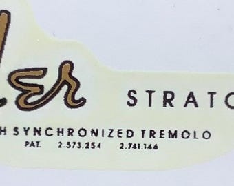 Aged 60s spaghetti gold decal for guitar headstock.