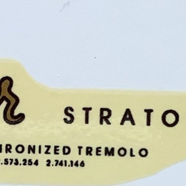 Aged 60s spaghetti gold decal for guitar headstock.