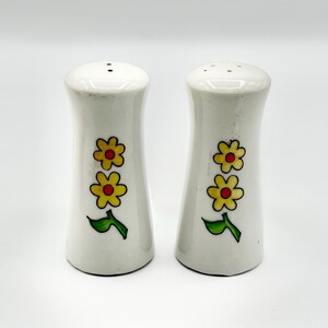 White Ceramic 1950’s Salt Pepper Shakers Yellow Green Flower Hand Painted Japan.