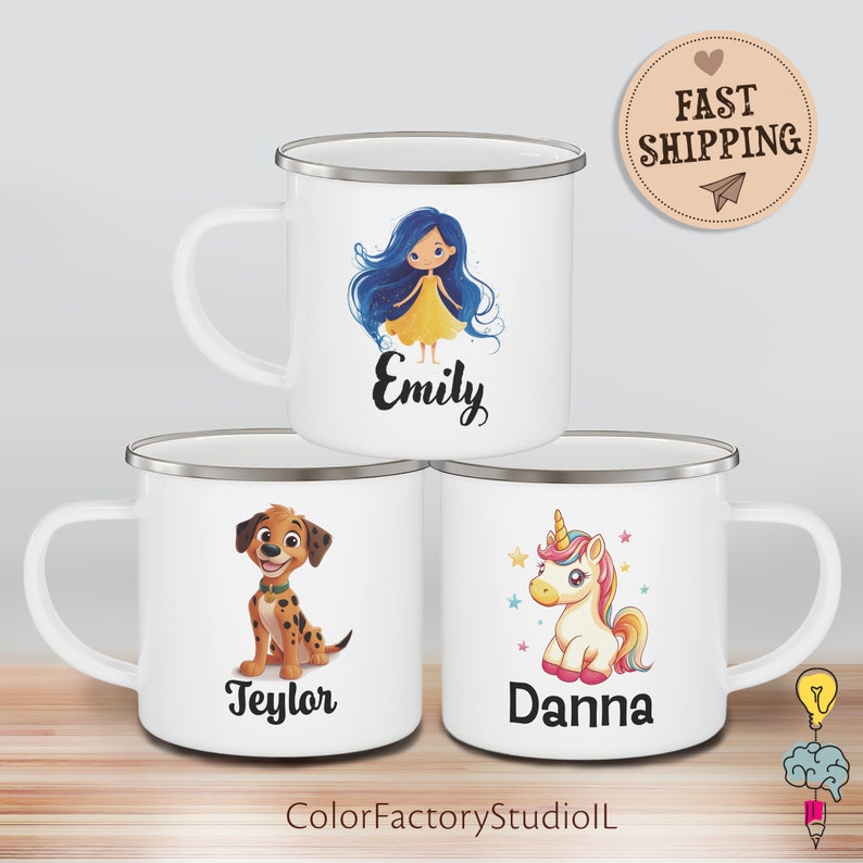 May include: Three white enamel mugs with personalized names and colorful cartoon images. The mugs feature a girl with blue hair, a dalmatian puppy, and a unicorn. The mugs have silver rims.