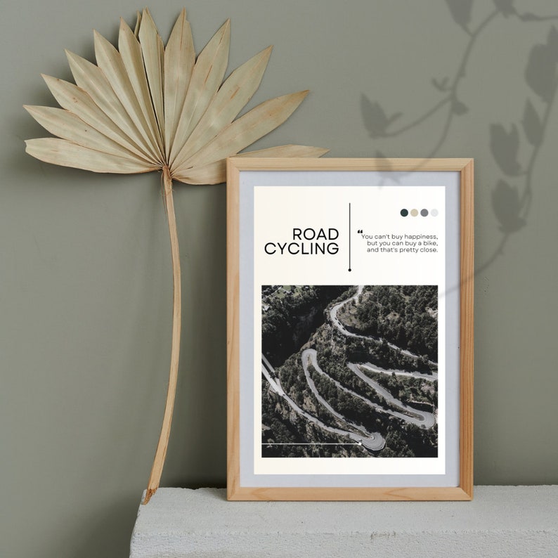 Puede incluir: Una impresi&oacute;n enmarcada con una cita sobre ciclismo de carretera. La impresi&oacute;n presenta una fotograf&iacute;a a&eacute;rea en blanco y negro de un camino sinuoso a trav&eacute;s de un bosque. La cita dice "No se puede comprar la felicidad, pero se puede comprar una bicicleta, y eso es bastante cerca."