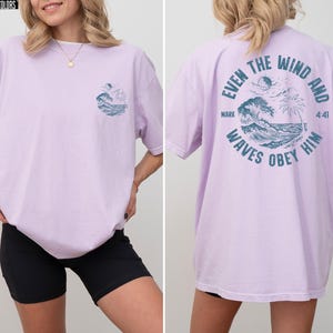 Experience the serene power of faith with our Comfort Colors shirt, inspired by the scripture from Mark 4:41. This waves obey him shirt beautifully captures a moment of divine calm, perfect for those who cherish ocean inspired style and seek a meaningful church service shirt. Crafted for comfort and spiritual connection, it’s an ideal choice for beach Christian gatherings or everyday wear.