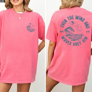 Experience the serene power of faith with our Comfort Colors shirt, inspired by the scripture from Mark 4:41. This waves obey him shirt beautifully captures a moment of divine calm, perfect for those who cherish ocean inspired style and seek a meaningful church service shirt. Crafted for comfort and spiritual connection, it’s an ideal choice for beach Christian gatherings or everyday wear.