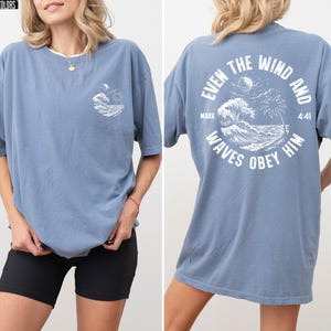 Experience the serene power of faith with our Comfort Colors shirt, inspired by the scripture from Mark 4:41. This waves obey him shirt beautifully captures a moment of divine calm, perfect for those who cherish ocean inspired style and seek a meaningful church service shirt. Crafted for comfort and spiritual connection, it’s an ideal choice for beach Christian gatherings or everyday wear.