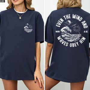 Experience the serene power of faith with our Comfort Colors shirt, inspired by the scripture from Mark 4:41. This waves obey him shirt beautifully captures a moment of divine calm, perfect for those who cherish ocean inspired style and seek a meaningful church service shirt. Crafted for comfort and spiritual connection, it’s an ideal choice for beach Christian gatherings or everyday wear.