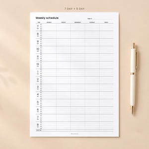 May include: A white weekly schedule planner sheet with black text and grid lines, featuring columns for Monday through Friday and hourly time slots from 7 AM to 8 PM. A cream-coloured ballpoint pen with gold accents rests to the right of the paper.