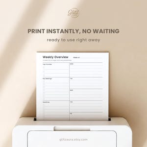 May include: A white printer outputting a paper sheet with a Weekly Overview planner template. The text reads PRINT INSTANTLY, NO WAITING, ready to use right away, and glitzaura.etsy.com. The planner includes sections for Top Priorities, Key Meetings, and Deadlines.