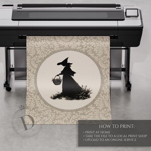 May include: A black and white illustration of a witch carrying a basket, printed on a beige background with a floral pattern. The image is displayed on a large format printer. Text on the bottom right reads "HOW TO PRINT: PRINT AT HOME, TAKE THE FILE TO A LOCAL PRINT SHOP, UPLOAD TO AN ONLINE SERVICE."