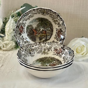 May include: A trio of ceramic mugs with a speckled, matte finish in cream, light grey, and dark grey. Each mug features a minimalist design and a rounded handle.