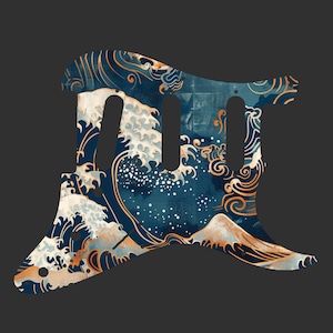 Puede incluir: Golpeador de guitarra con un diseño de olas japonesas en tonos azules, blancos y dorados. El golpeador tiene tres cortes para pastillas y una forma curva. El diseño incluye una montaña en el fondo.
