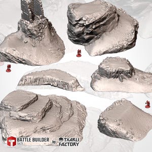 May include: A selection of grey, textured terrain pieces for tabletop gaming. Includes various rock formations, a small tower, and miniature figures. The pieces are designed to create a realistic gaming environment. The Battle Builder tech logo is visible.